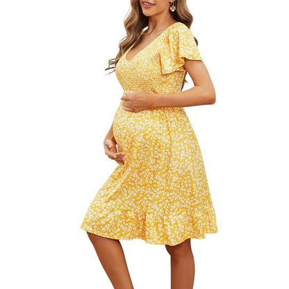 Women's maternity blouse with ruffle details and floral pattern